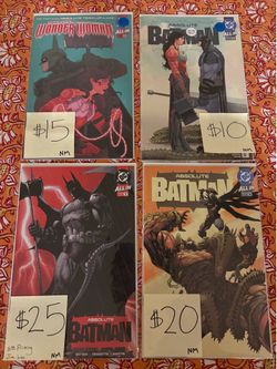 Absolute Batman 1, 14, 16, and Absolute Wonder Woman 15