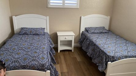 2 Twin size bed  with mattress and bed frame night stand no included