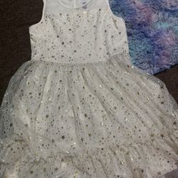 Cream colored dress with gold stars 