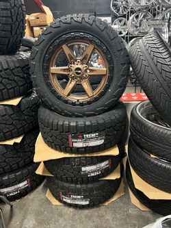 20 INCH RIMS AND ALL TERRAIN TIRES