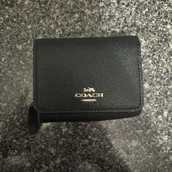 coach leather black and gold wallet 