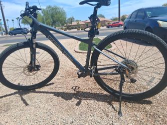 Ozark trail 29 inch mountain bike with full disc brakes suspension sharks Aluminum Aluminum frame: The bicycle features a  mention that the bike feels