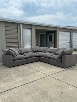 Gray sectional cloud couch