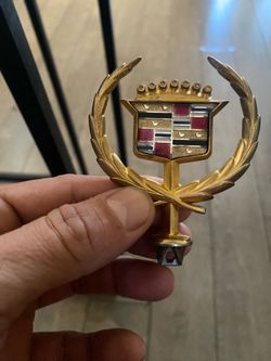 Cadillac coupe deville emblem