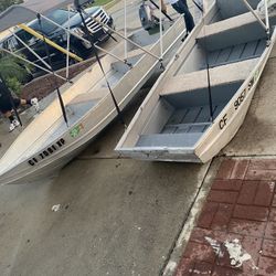 Two aluminum boats