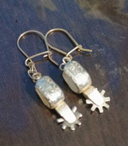 Silver spur earrings