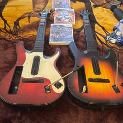 2 Guitar Hero Guitars And 3 Games 