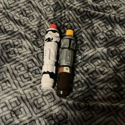 Storm trooper and Mandalorian Lightsaber