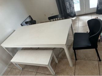 Dining room table and chairs with bench.