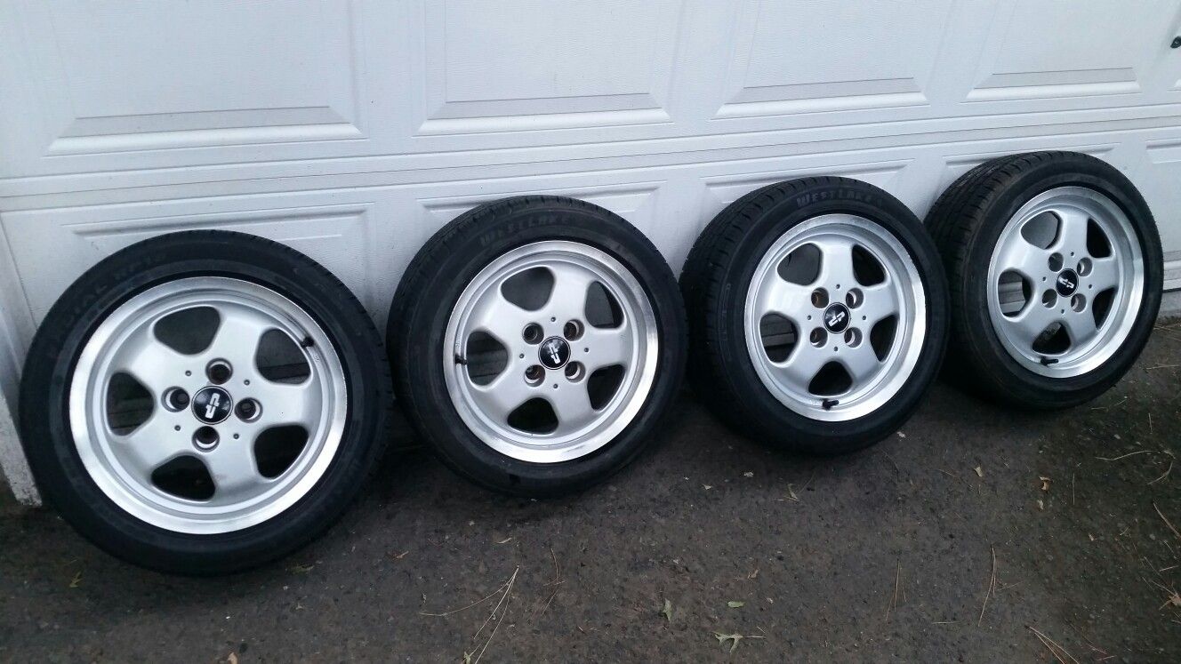 15" 4x100 Dp Motorsports wheels w/ 195/50/15 tires