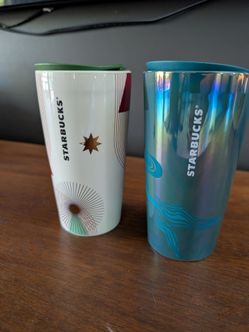 Two Starbucks ceramic coffee tumblers with lids