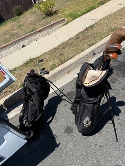 2 Callaway golf bags with goodies