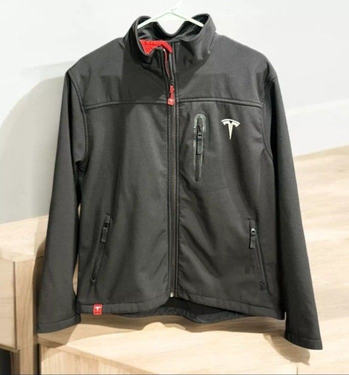 Tesla Black softshell Jacket full zipper Size: XL
Tesla 
Softshell black jacket