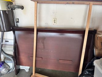 Free-Dark Cherry Wood Sleigh Bed- queen, frame, headboard, and footboard included.