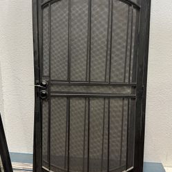 Two black security door ride opener size 36 x 80