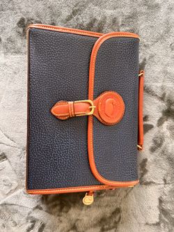 Dooney & Bourke All-Weather Leather Clutch Bag