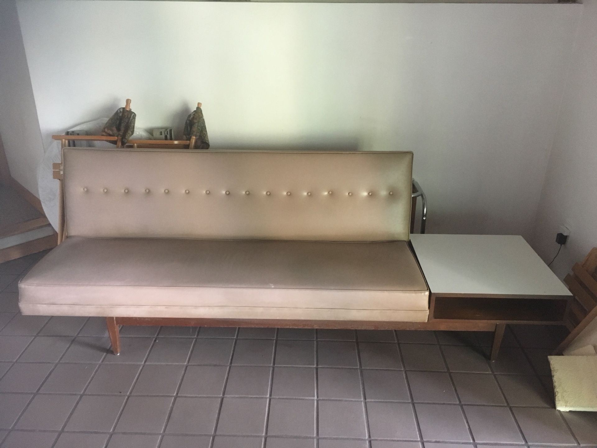 Vintage Naugahyde couch with end table attached. Make offer, need it gone ASAP.