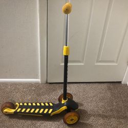 Scooter With Lightning Wheels and Adjustable Handle