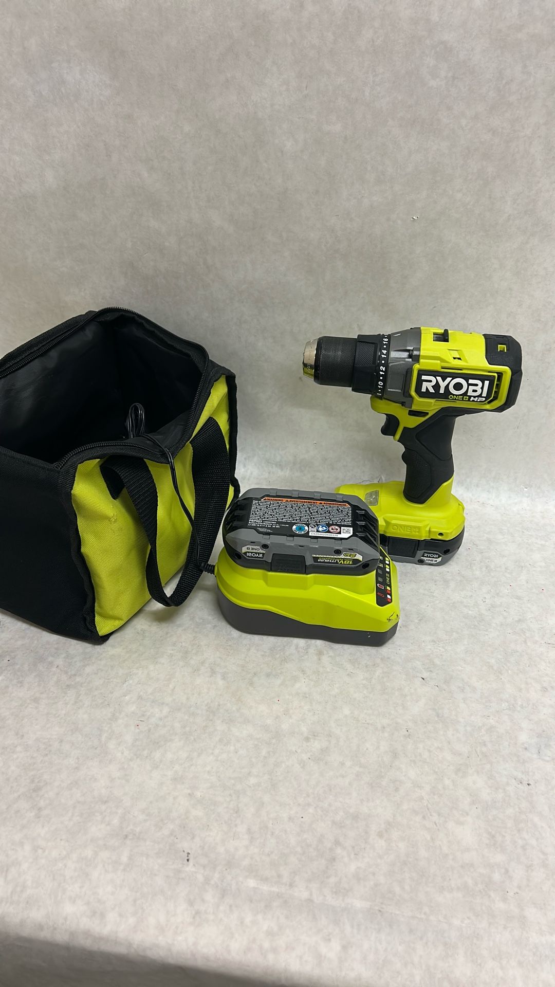 Ryobi one plus half inch drill with two batteries, charger and soft case