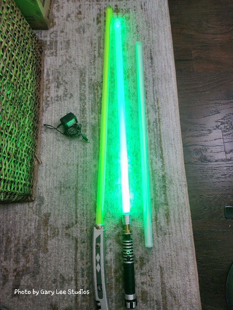 2 High End Light Sabers With Extra Tube. Mint Condition.