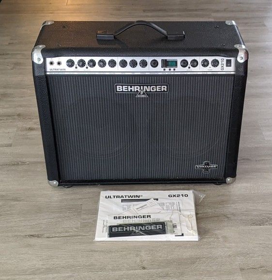 Behringer GX210, Near Mint Shape, 31 Effect, 60 watts, 2 Jensen 10" Speakers. No trades.