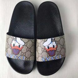 Donald duck gucci slides Clearance