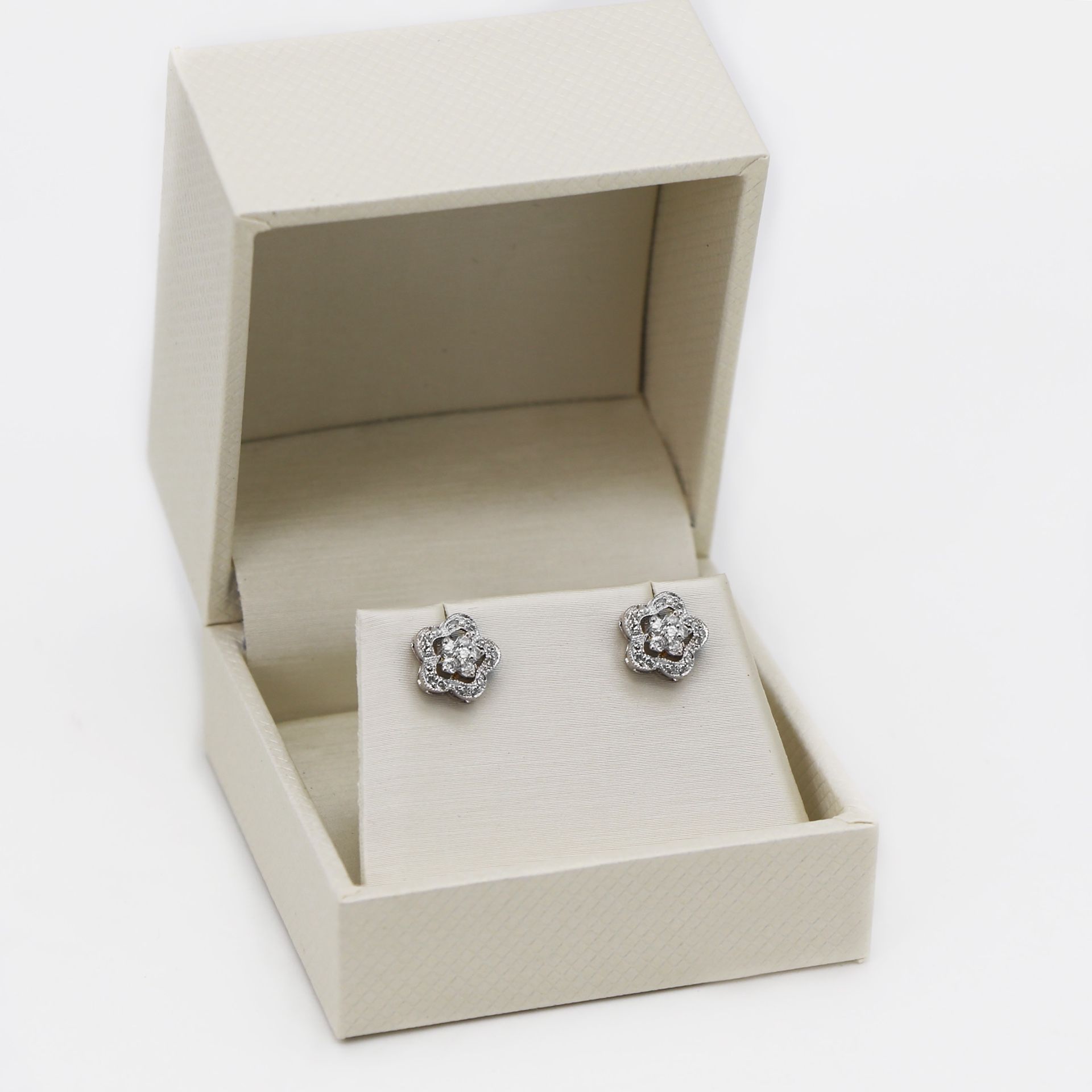 14K Gold Flower Diamond .40twc Stud earrings. Only $500