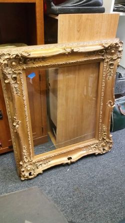 30 X 35 gold frame with glass