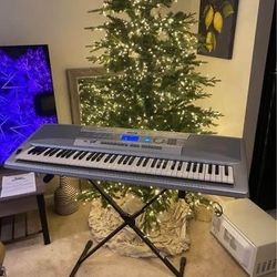 Yamaha Portable Grand 76-Key Electronic Music Keyboard with Portable Stand & Charger