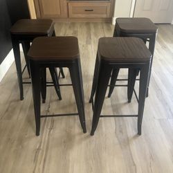 4. Brown And Black Stools. 