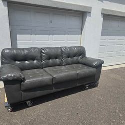 Gray leather sofa $350 obo - Delivery included