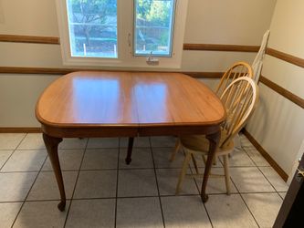 Antique table and mismatching chairs