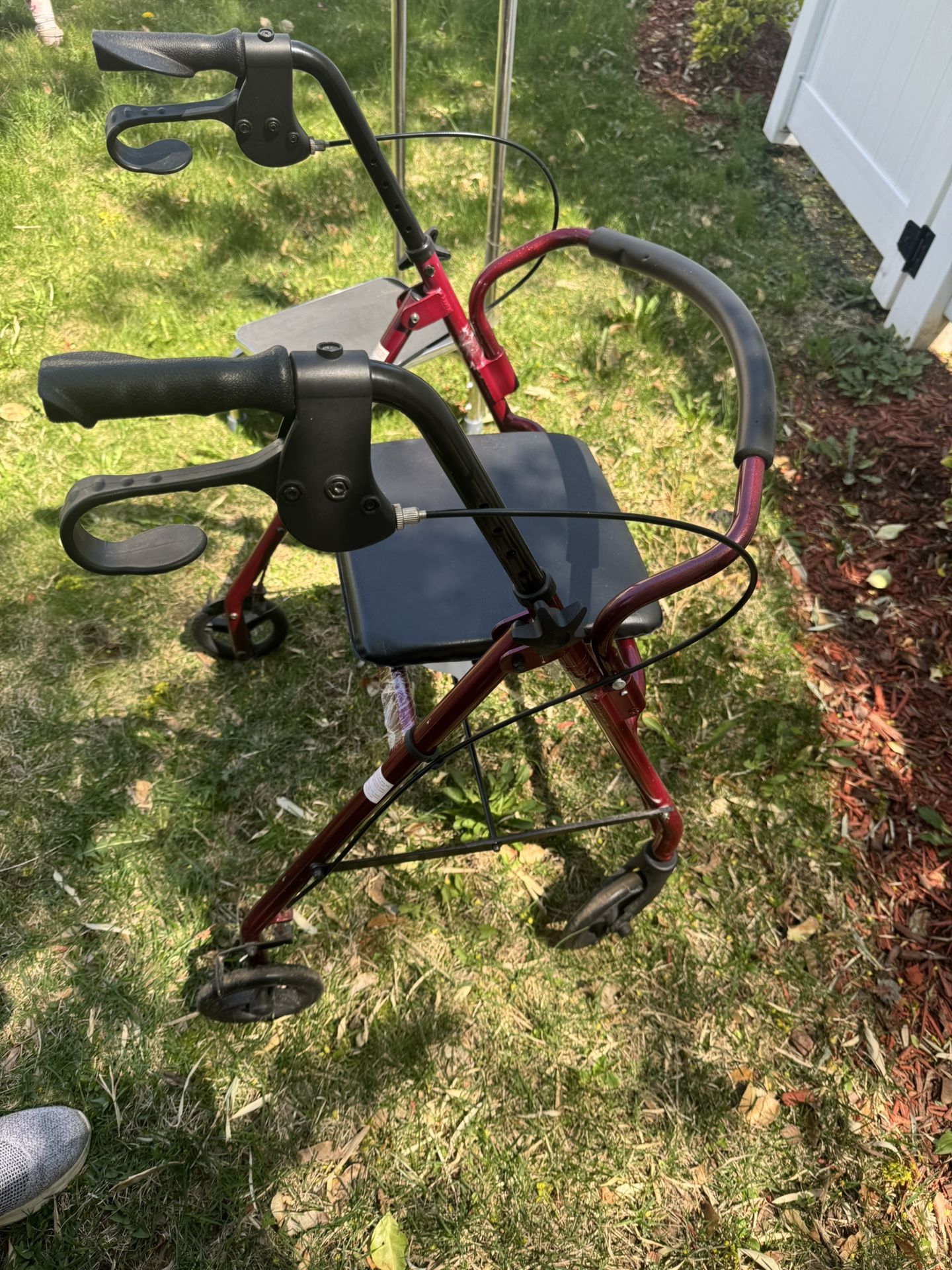Walker with seat and brakes