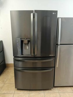 LG REFRIGERATOR 4 DOORS, STAINLESS STEEL, DARK COLOR PLUS FREE SHIPPING AND INSTALLATION