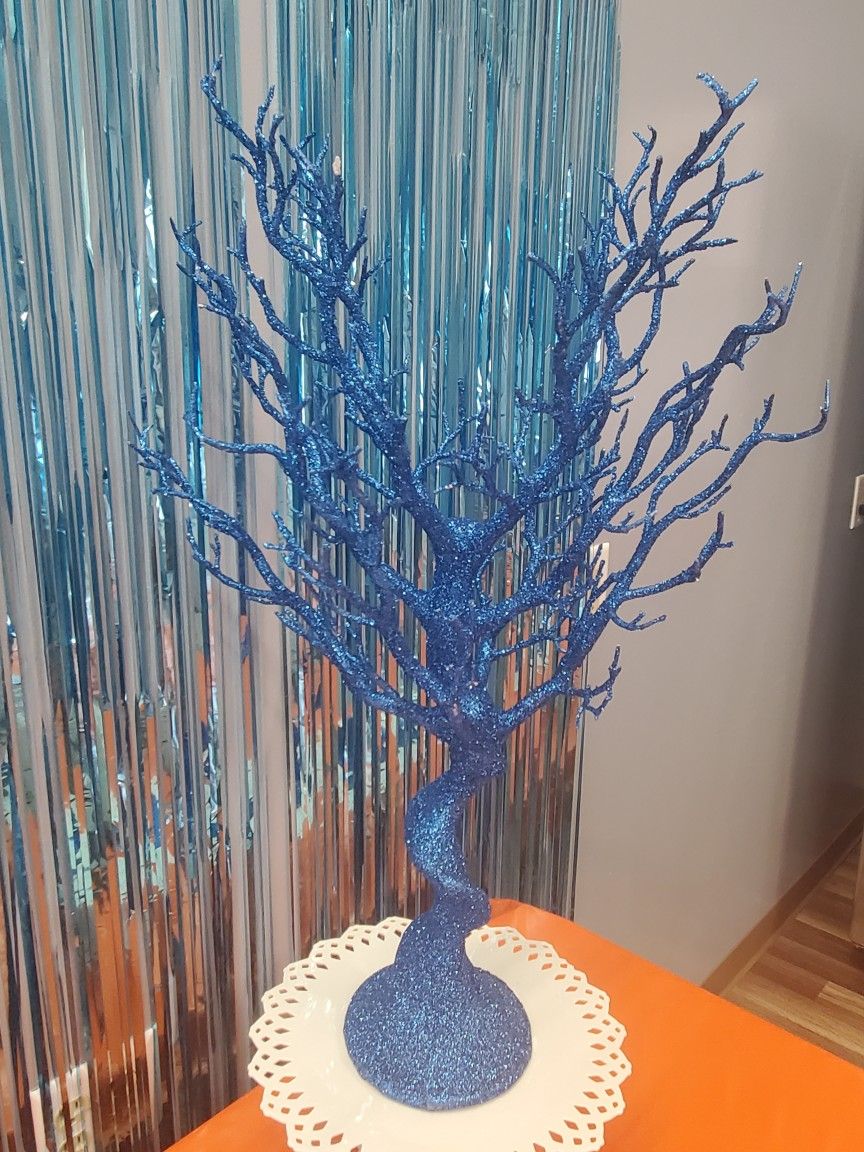 Two blue glitter tree displays
