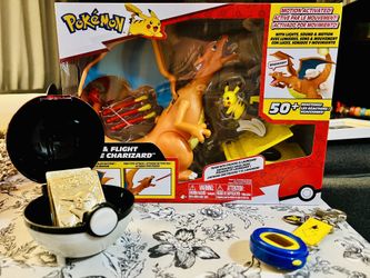 Pokémon Lot: Rare 1998 Virtual Pet Pocket Pikachu, 1999 Burger King Pokemon Gold Bars, Charizard Toy