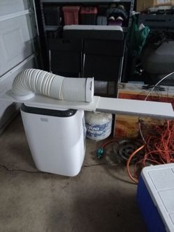 Black + Decker Portable AC. Model number is in the second picture. Move in the house now. Don't need this one. Still like new