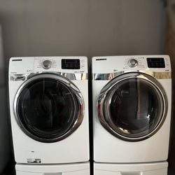 Samsung washer and electric dryer set.