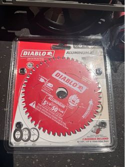 Milwaukee fuel m12 saw with blade battery and bag