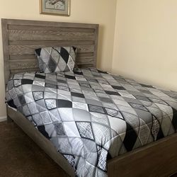 Complete Queen size bed with mattress and frame.