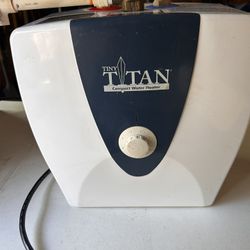 Mini Water heater - 2.5 Gallon Point-of-Use Specialty Electric Water Heater. 1/2 inch connections. Works. Do not need it anymore. Compare at over $400