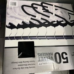 100 New velvet hangers