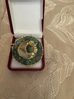 Green stone pin