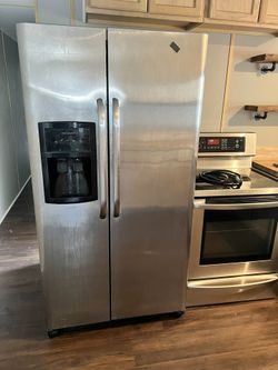 Frigidaire Refrigerator And Lg Stainless Steal  Stove