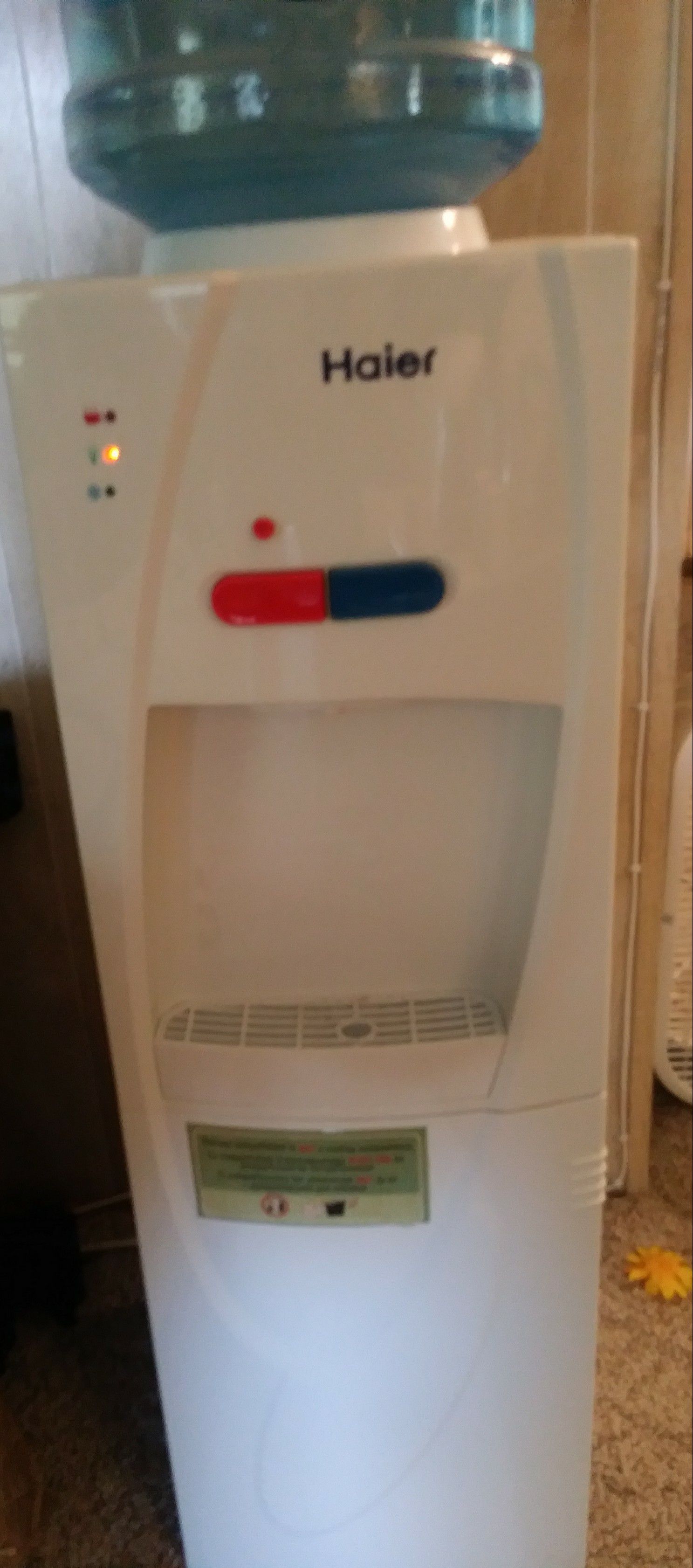 Water cooler floor stand .with hot water and mini storage .good working condition 110 volts