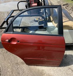 2004 KIA SPECTRA OEM DOOR !