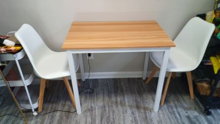 Small Dinette Table with Four White Chairs