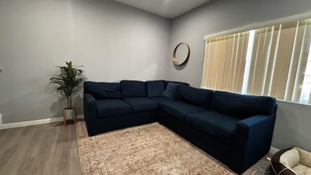 Blue L shaped couch
