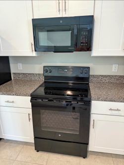 Black kitchen appliances set four unit