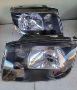 99-05 Volkswagen Jetta Headlights LUCES MICAS FAROS Calaveras Focos